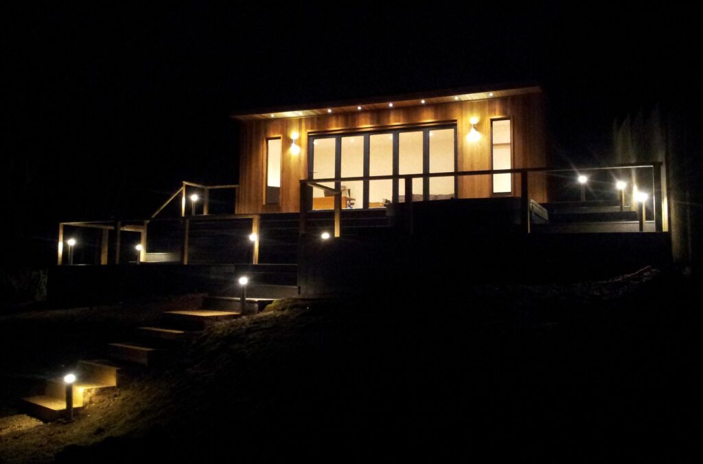 A Garden Room illuminated at night